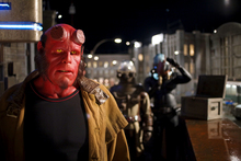 Hellboy (Ron Perlman) backed by Johann (James Dodd) and Abe Sapien (Doug Jones) in Hellboy II: The Golden Army