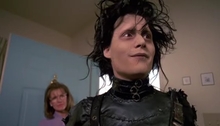 Edward Scissorhands (Johnny Depp) makes himself at home.